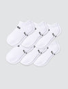 Six pairs of Cozy Earth Women's Essential Ankle Socks in white, featuring black text near the elastic opening, are arranged in two overlapping rows on a light gray background.|Color:White