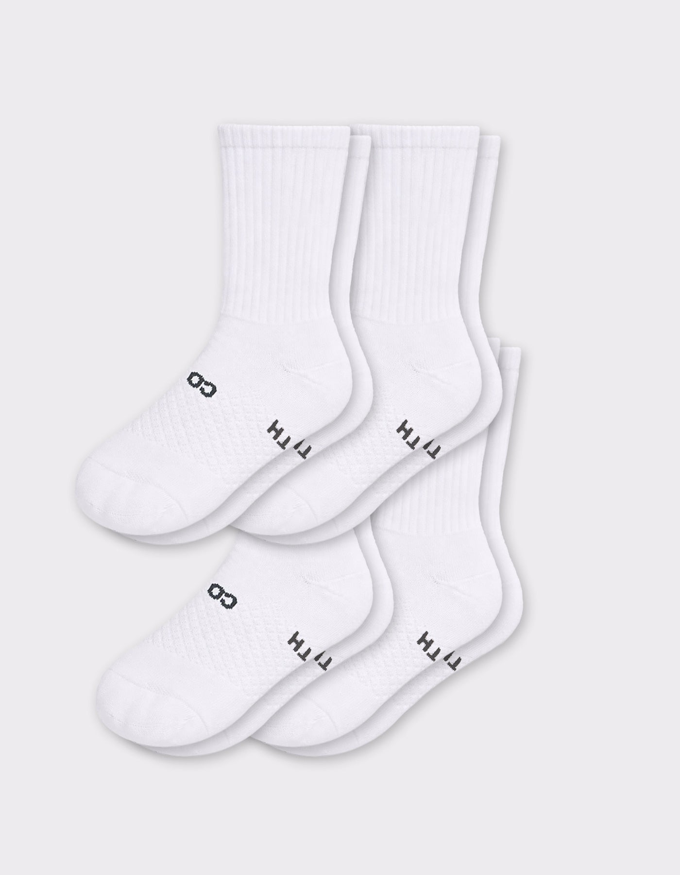 Cozy Earth Men's Essential Calf Sock 4-Pack in white, featuring black text near the toes, displayed on a light gray background.