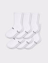 Six pairs of Cozy Earth Men's Essential Calf Socks in white are arranged in two rows on a light gray background, each featuring small black text and a symbol near the toes and ribbed cuffs.