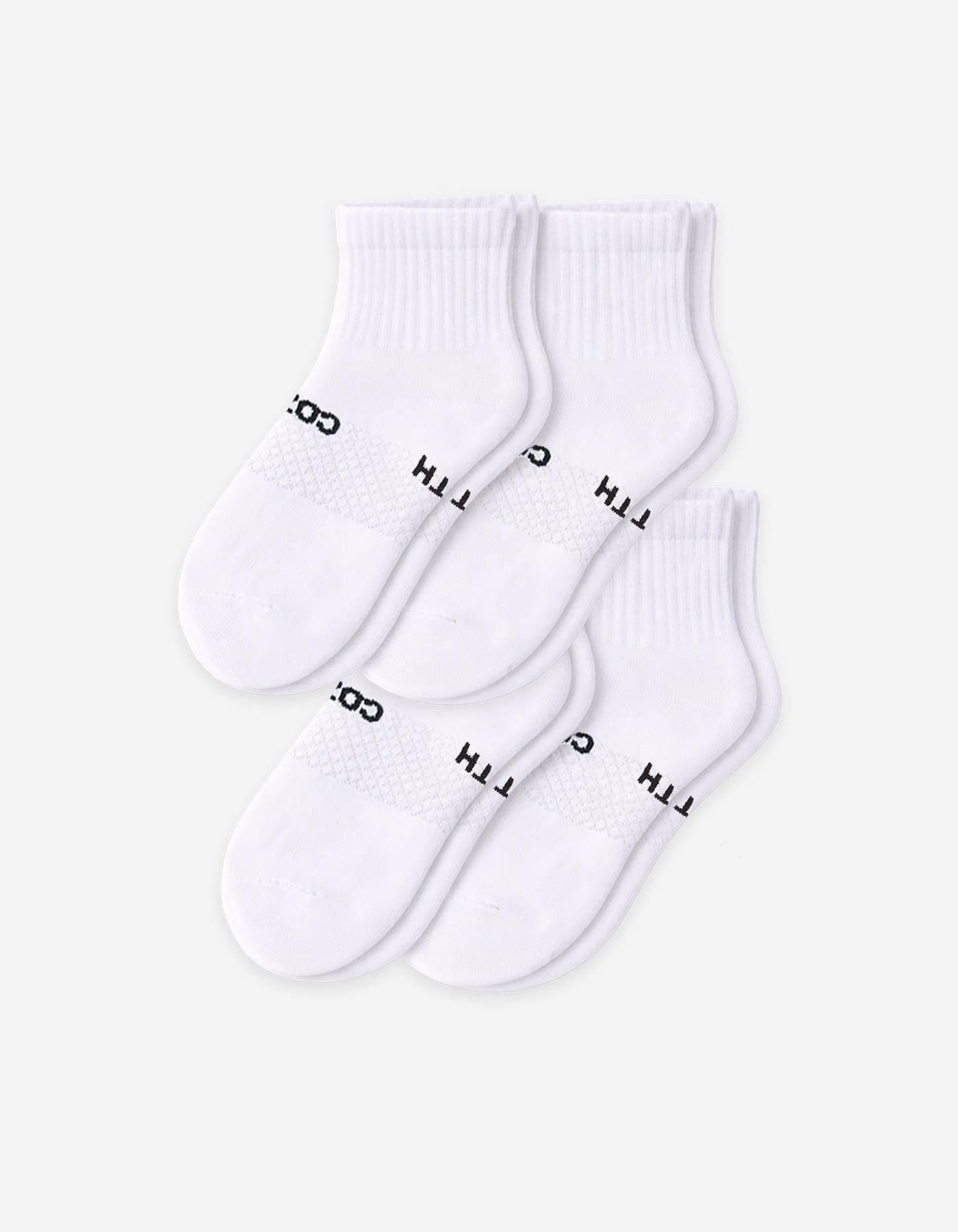 Four pairs of Cozy Earth Women's Essential Quarter Socks in white, featuring ribbed cuffs and black text, are arranged overlapping on a plain light background.
