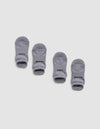 Four small gray Essential Ankle Socks by Cozy Earth are arranged in two pairs on a white background. The left pair has "COZY" and the right pair has "EARTH" printed in black text near the cuff.|Color:Stone