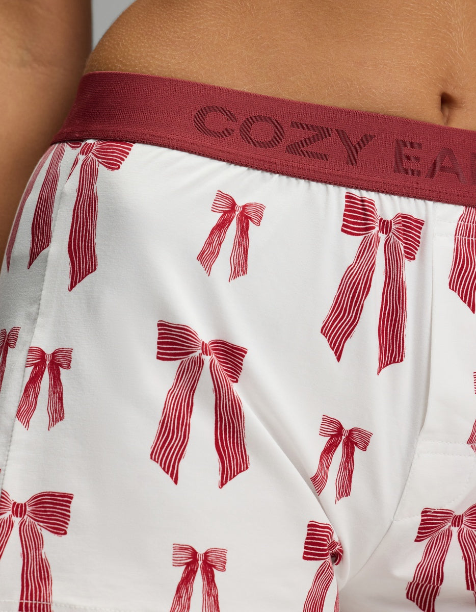 Cozy Earth Women’s First Layer Pajama Boxer Short in white with a red striped bow pattern and a wide maroon waistband.