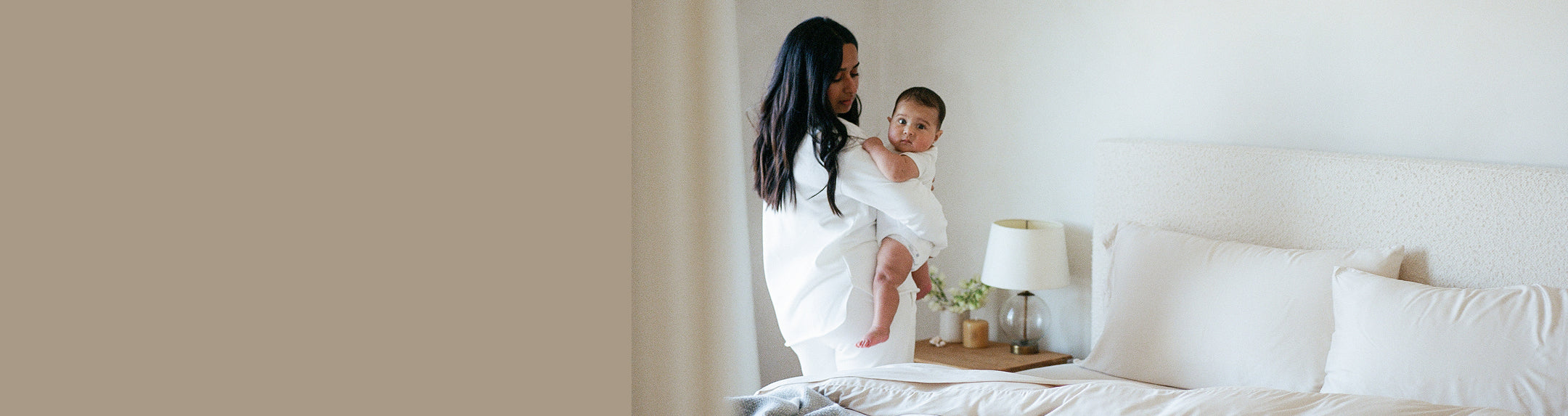 Woman sleeping peacefully in a bed with white bedding