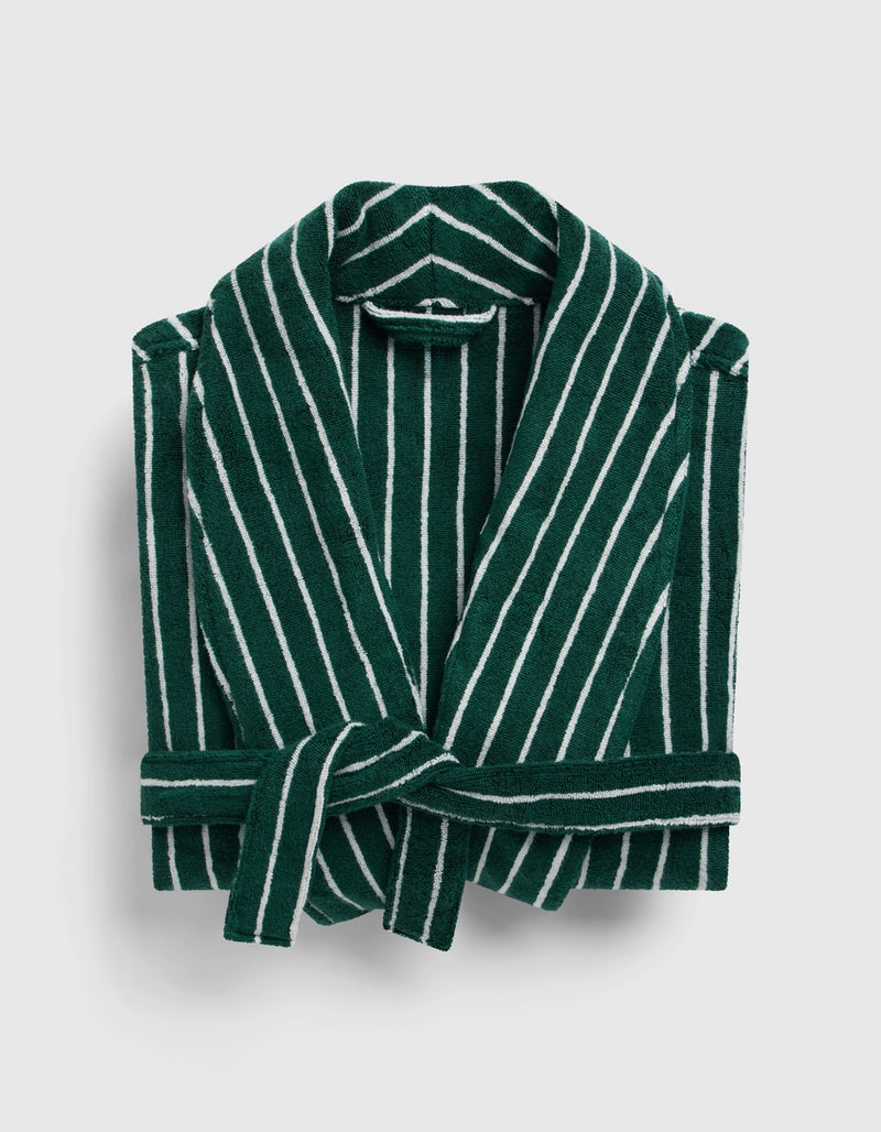 The Luxe Bath Robe by Cozy Earth in dark green with white vertical stripes and a matching belt, displayed on a light gray background.