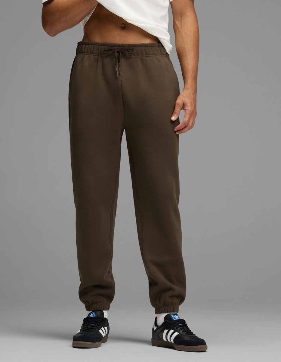 Cozy Earth Men’s Cityscape Sweatpant in dark brown with an elastic waistband and cuffs.