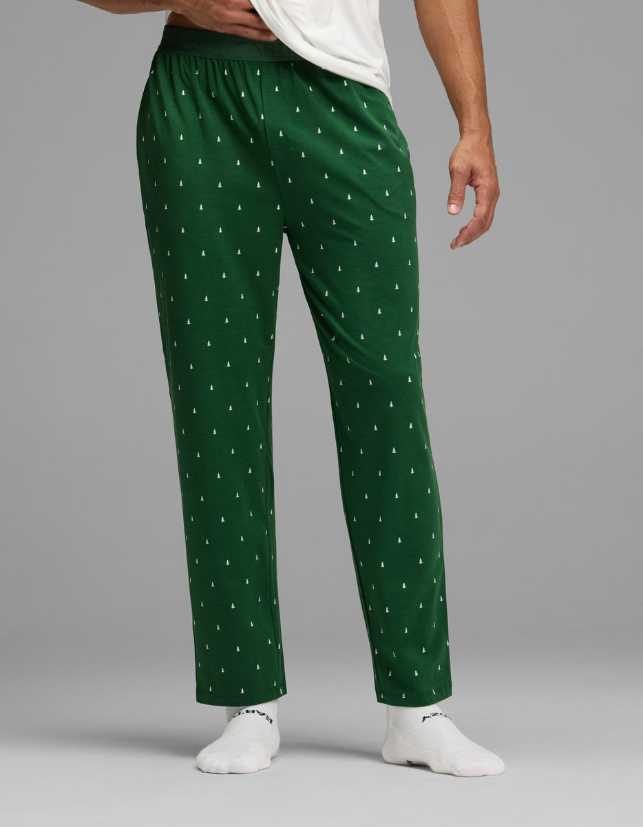 Cozy Earth Men’s First Layer Pajama Pant in green with a white repeating pattern of small pine trees.