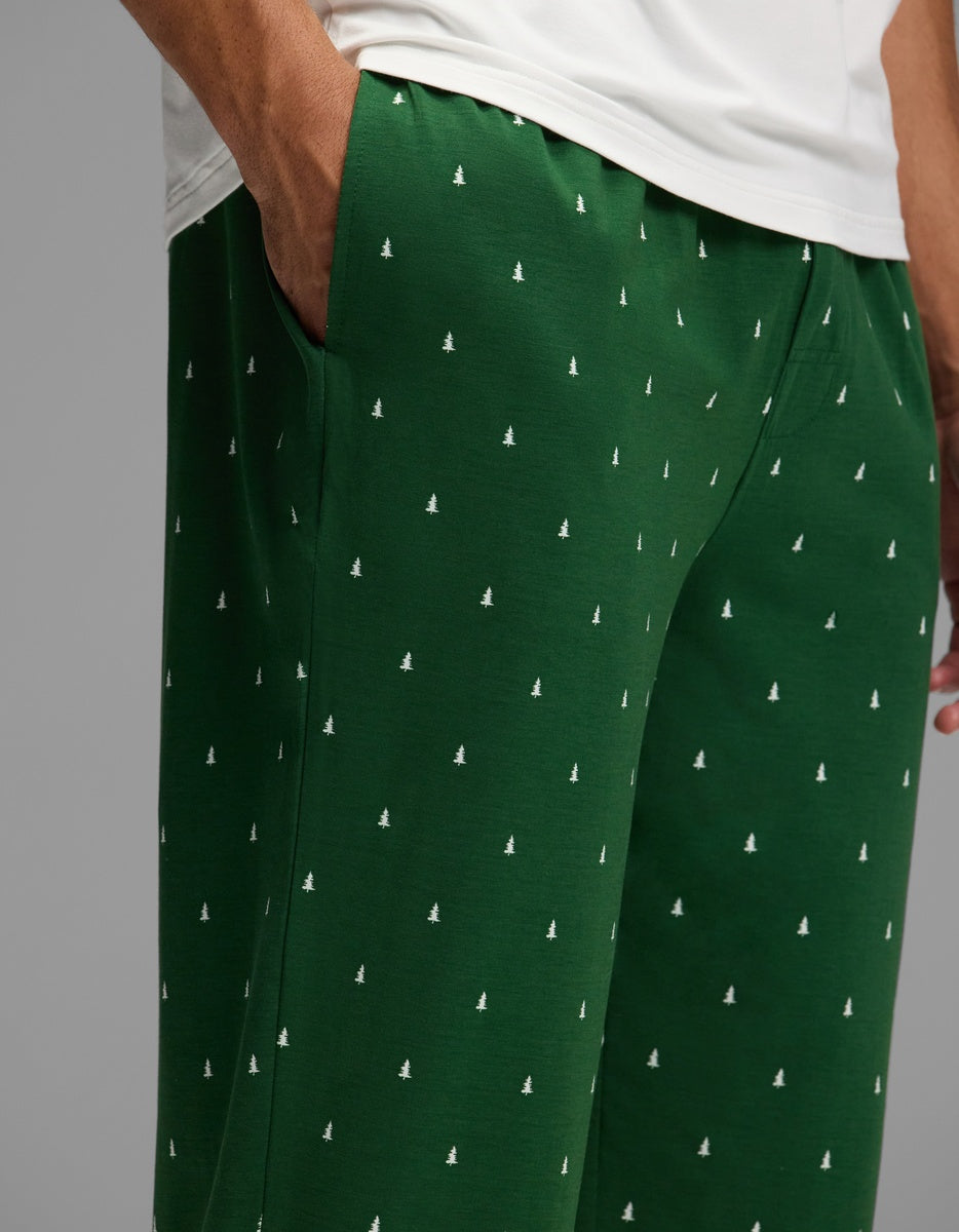 Cozy Earth Men’s First Layer Pajama Pant in green with a small white pine tree pattern.