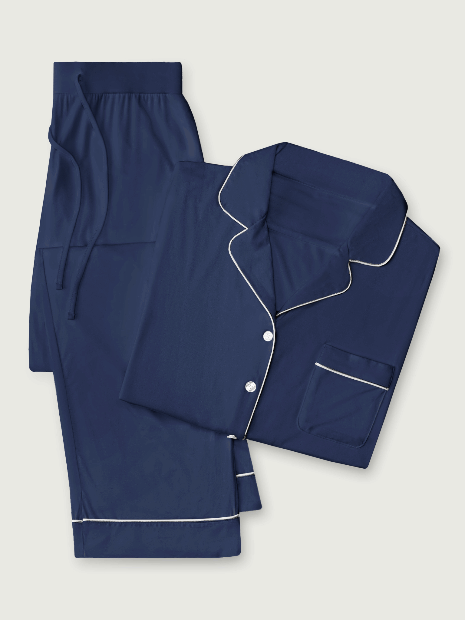 Navy Long Sleeve Pajama Set. The photo was taken close up, showing off the print of the pajamas. 