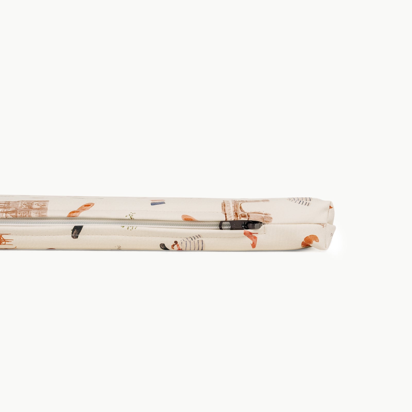 The Gathre Wholesale Padded Changing Mat is a folded, cream-colored pouch with a zipper, featuring playful animal and tree prints in brown, orange, and gray tones, displayed against a white background.