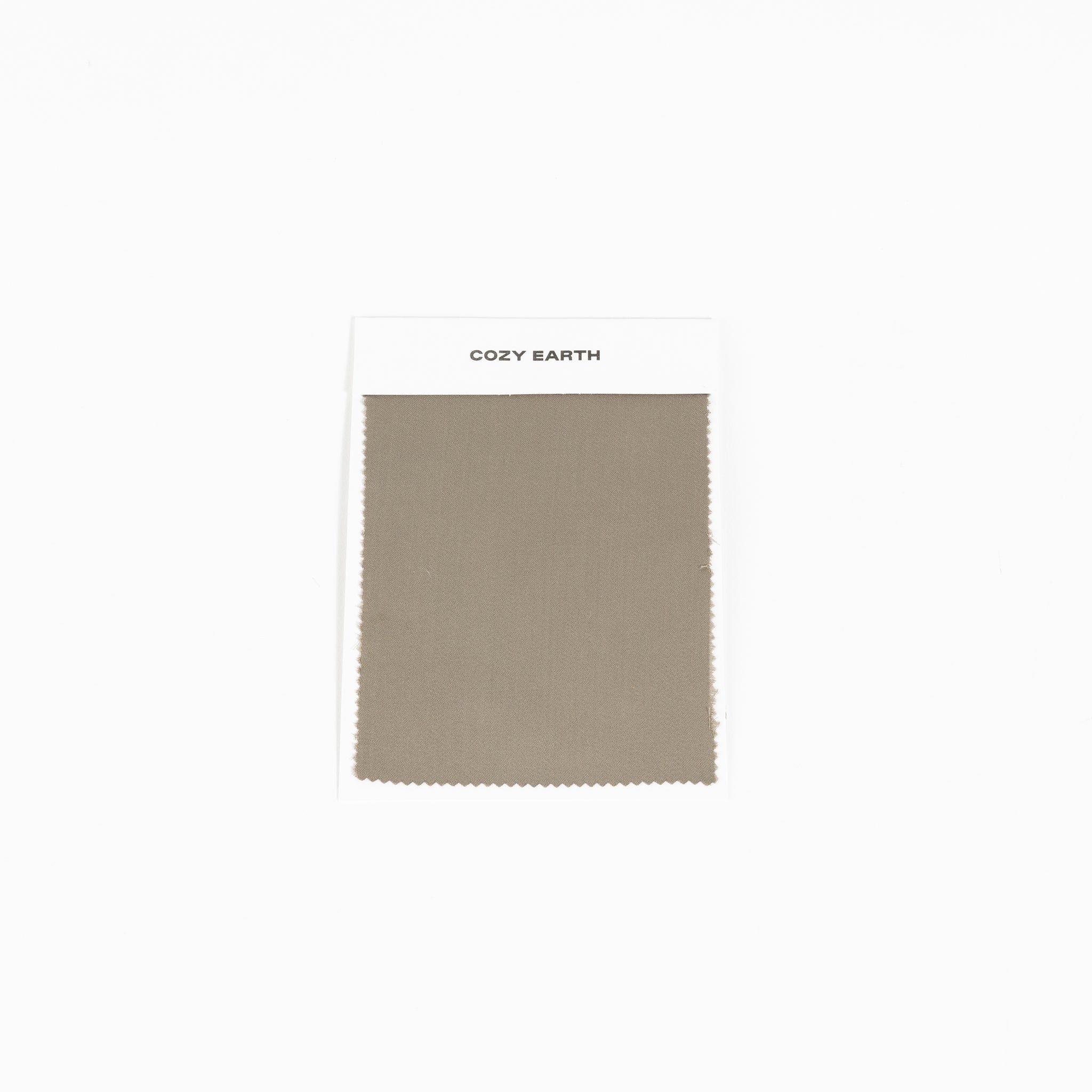 An olive green Bamboo Sheet Swatch with a fine texture and neatly cut edges is displayed on a white card labeled "Cozy Earth" against a plain white background. |Color:Walnut