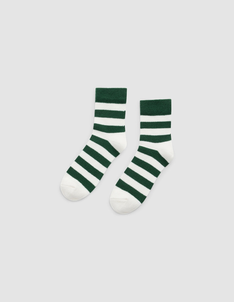 Women’s Plush Lounge Quarter Sock featuring a pair of ankle socks with dark green and white horizontal stripes.