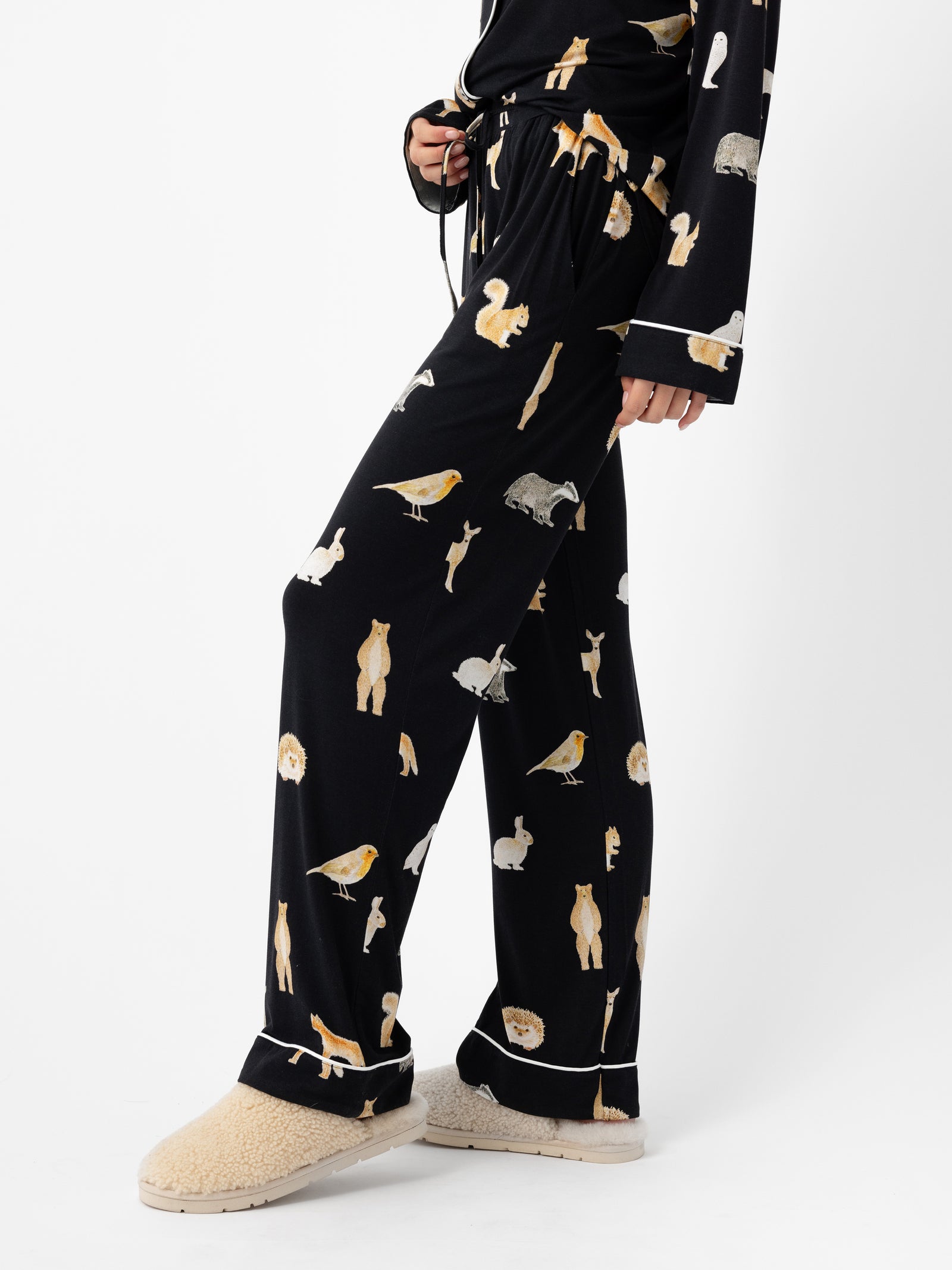 Woman wearing Women's Stretch-Knit Bamboo Pajama Pant in Woodland Creatures Black 