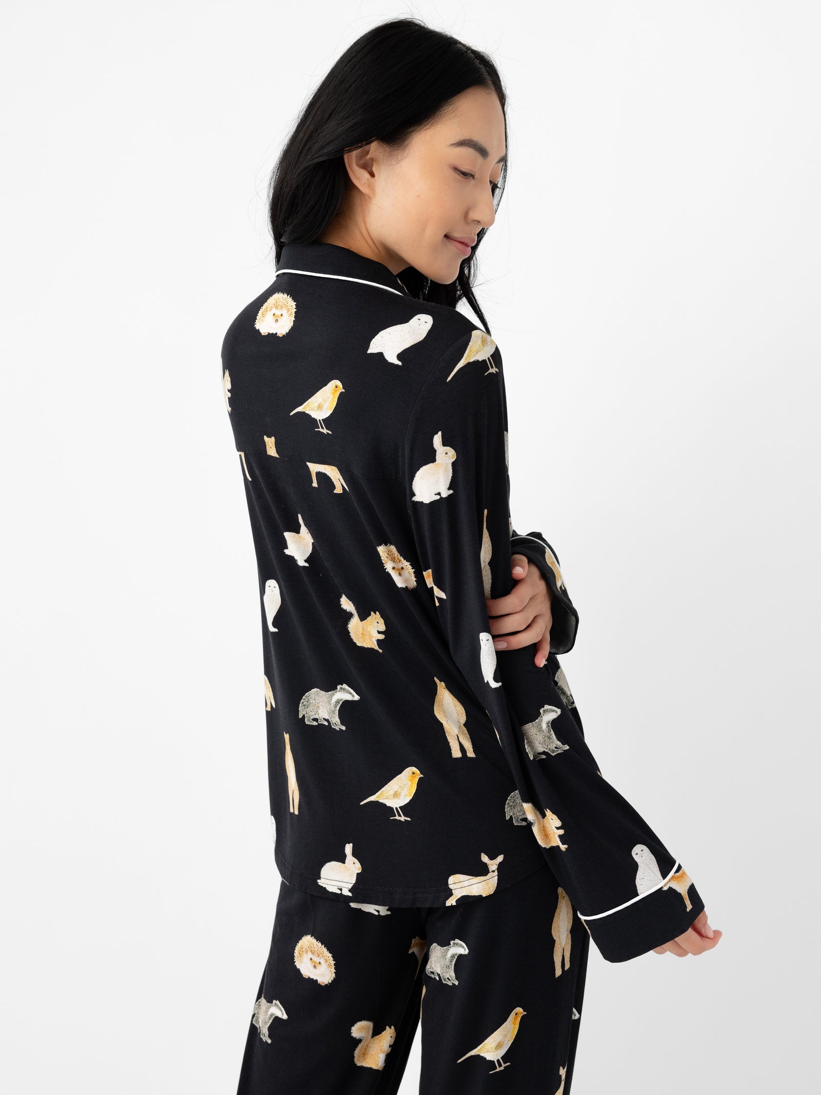 Woman wearing Women's Long Sleeve Bamboo Pajama Top in Stretch-Knit - Woodland Creatures Black 