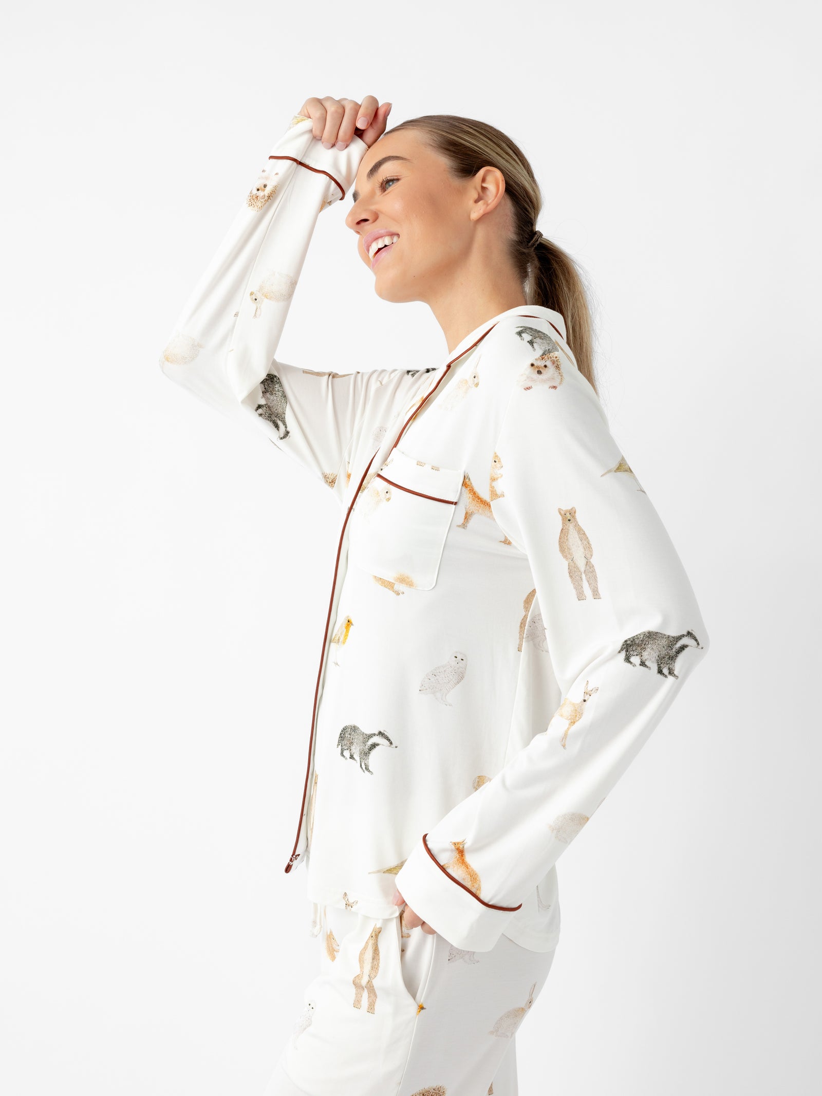 Woman wearing Women's Long Sleeve Bamboo Pajama Top in Stretch-Knit - Woodland Creatures Ivory 