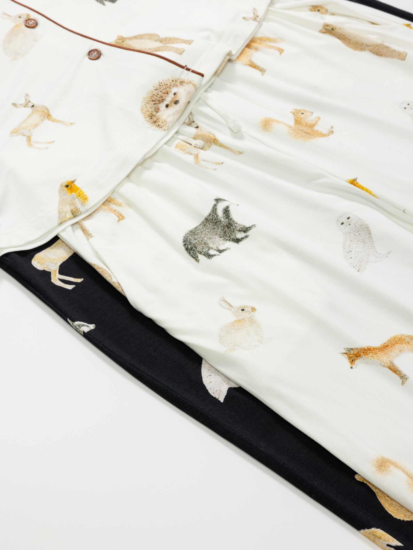 Close-up of Women's Stretch-Knit Bamboo Pajama Pant in Woodland Creatures Ivory and Black 