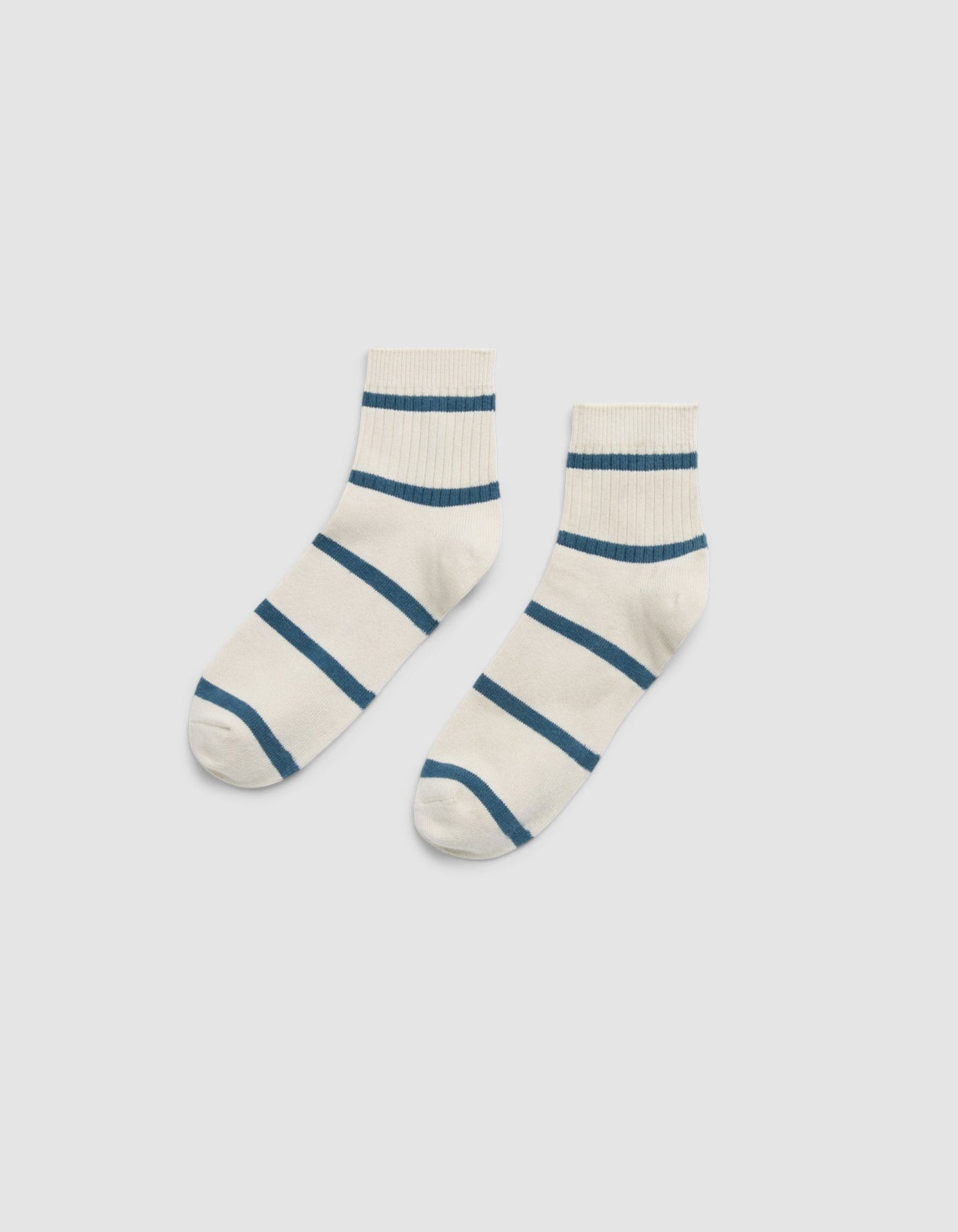 Cozy Earth Women's Sadie Sock: white ankle socks with horizontal blue stripes, shown side by side on a plain light gray background. |Color:Mineral/Oceanside
