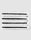 A stack of four neatly folded Cozy Earth Striped Luxe Washcloths in white with evenly spaced black stripes, set against a plain light gray background. |Color:Black Stripe