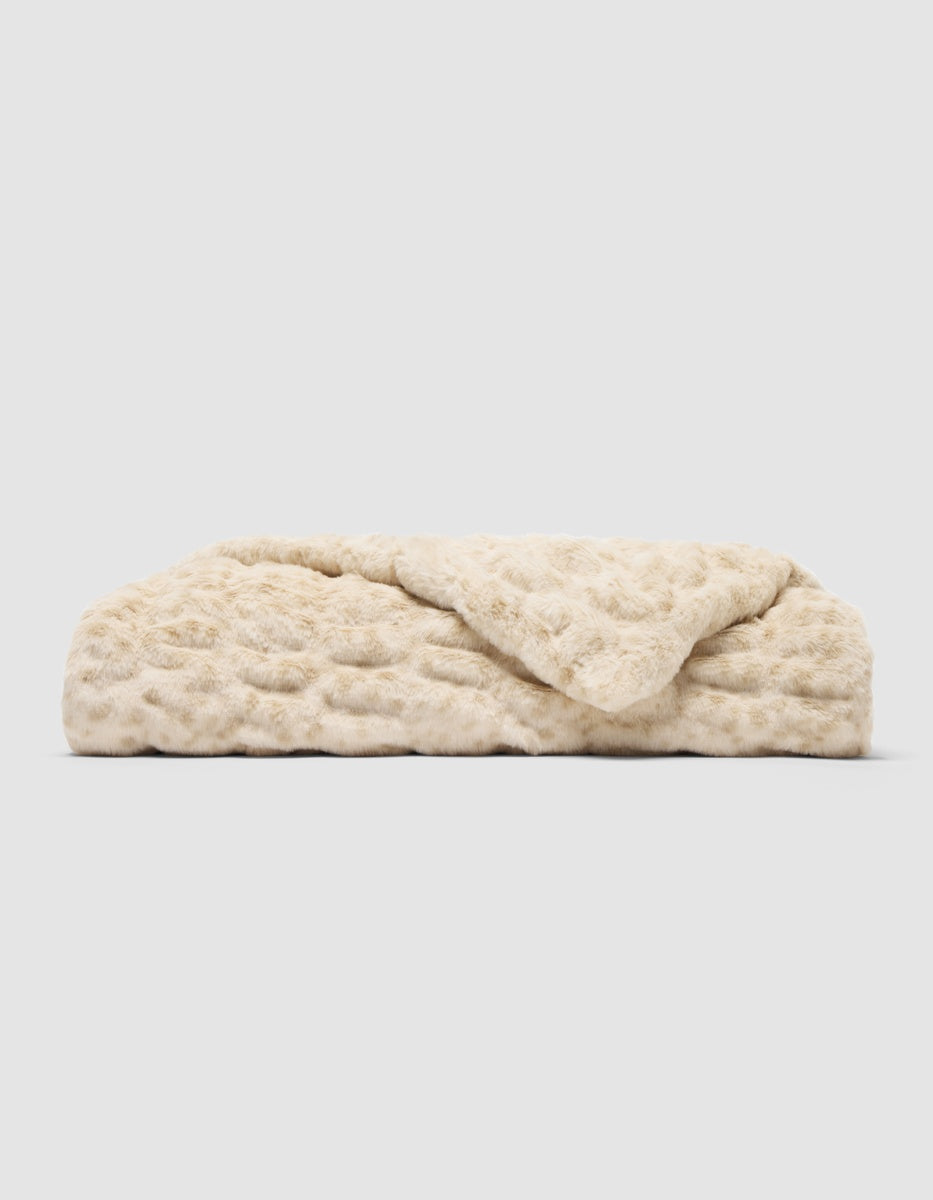 Folded Macadamia Lynx-colored Snuggle Cuddle Blanket with a subtle embossed texture.|Color:Lynx in Macadamia