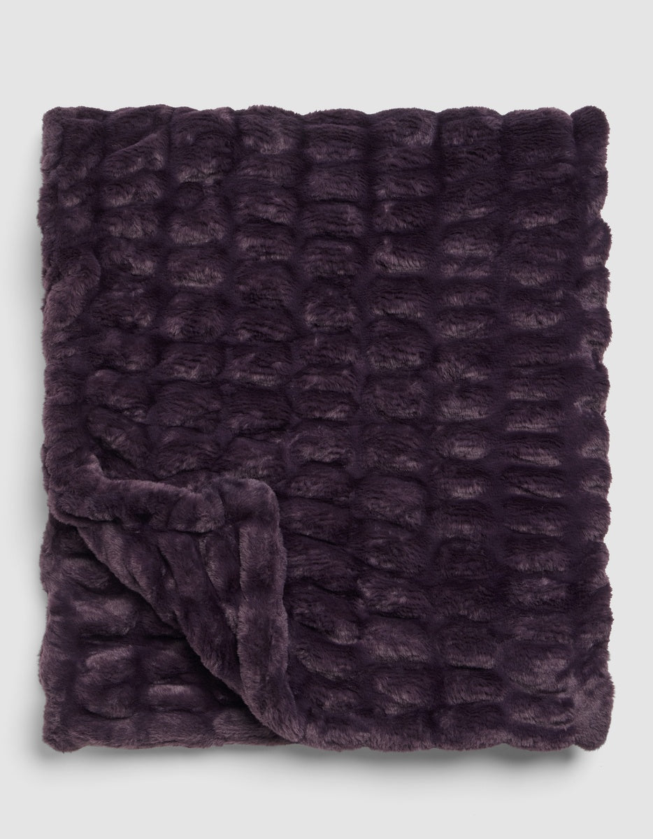 Plum-colored Snuggle Cuddle Blanket with a textured, quilted pattern.