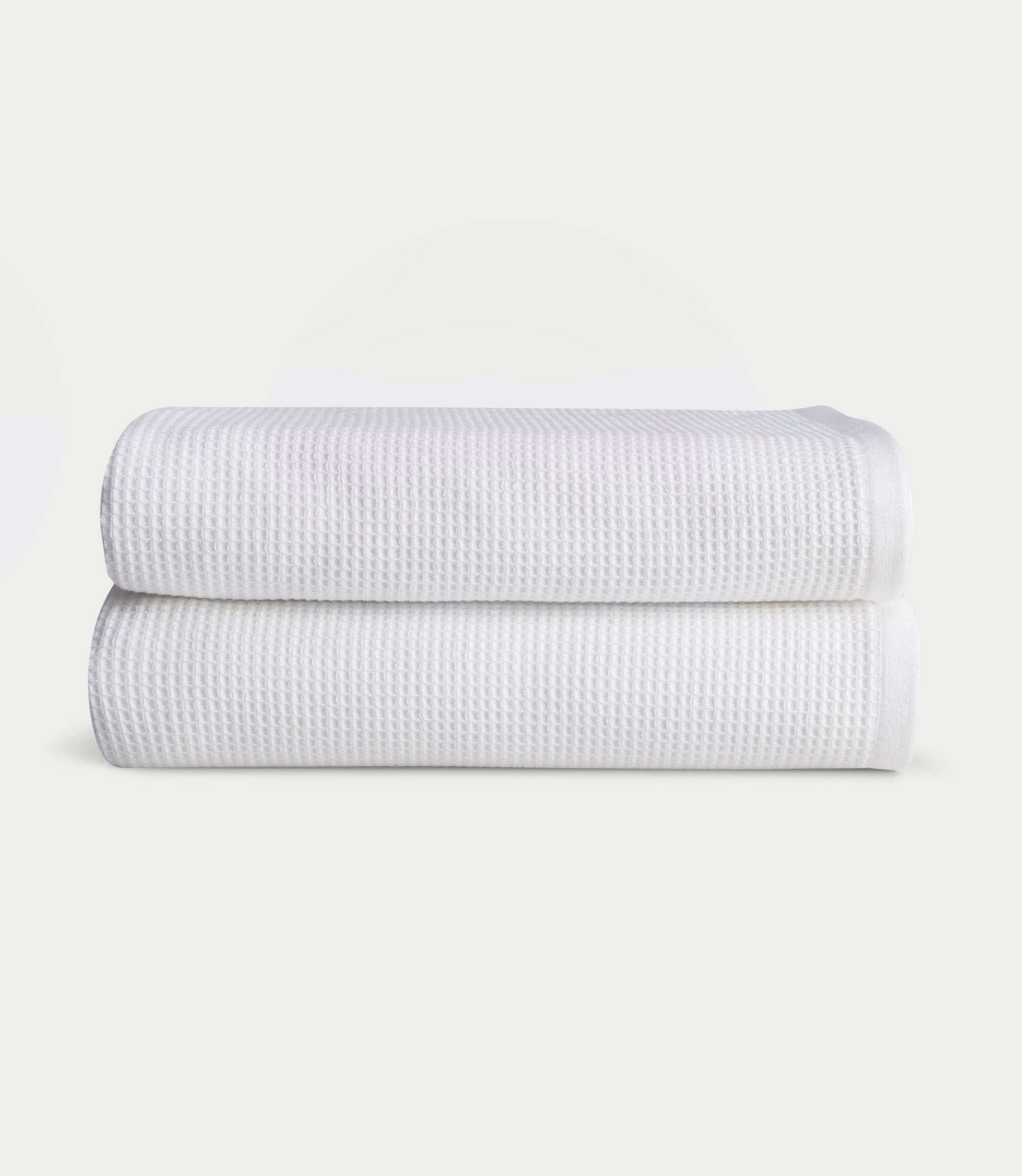 Waffle Bath towels in the color White. Photo of white Waffle Bath towels taken with white background. |Color:White