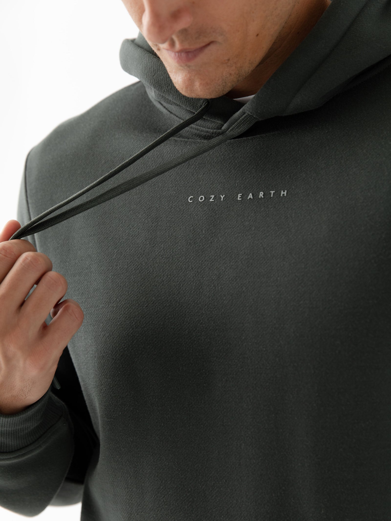 Close up of man wearing cityscape storm hoodie 
