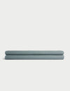A folded light blue Cozy Earth Waffle Bath Sheet is displayed on a plain white background. |Color:Brook