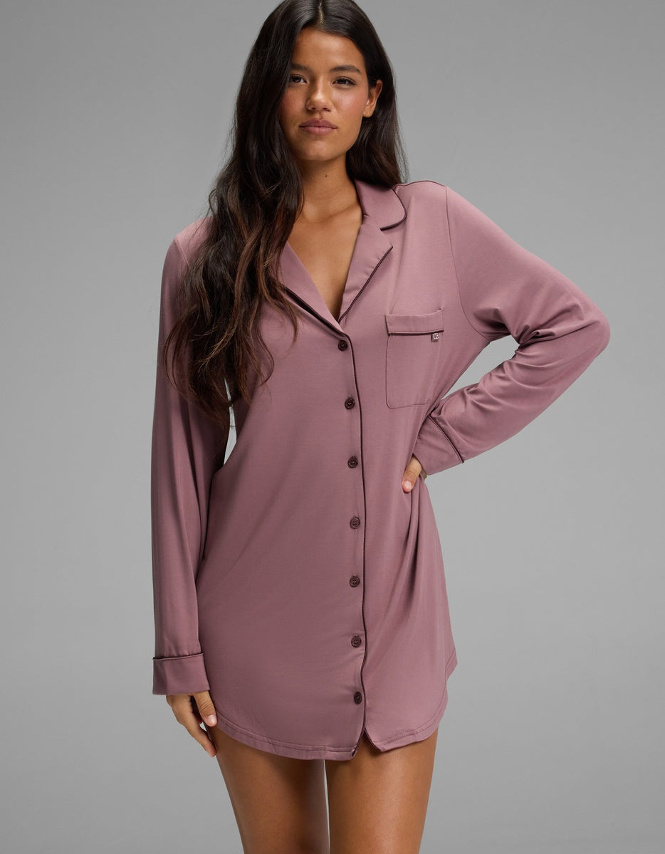 A mauve Cozy Earth Women’s Bamboo Stretch-Knit Long Sleeve Sleep Dress featuring a button-down front, collared neckline, and a chest pocket.