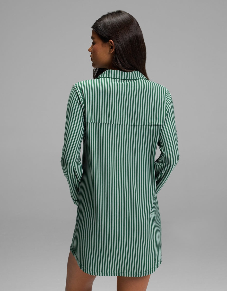 Woman from behind wearing a green and white vertical striped Cozy Earth Women’s Bamboo Stretch-Knit Long Sleeve Sleep Dress with a notched collar.