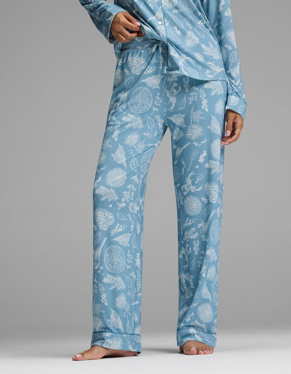 Cozy Earth Women’s Bamboo Stretch-Knit Pajama Pant in light blue with a white botanical and citrus print, featuring an elastic drawstring waistband.