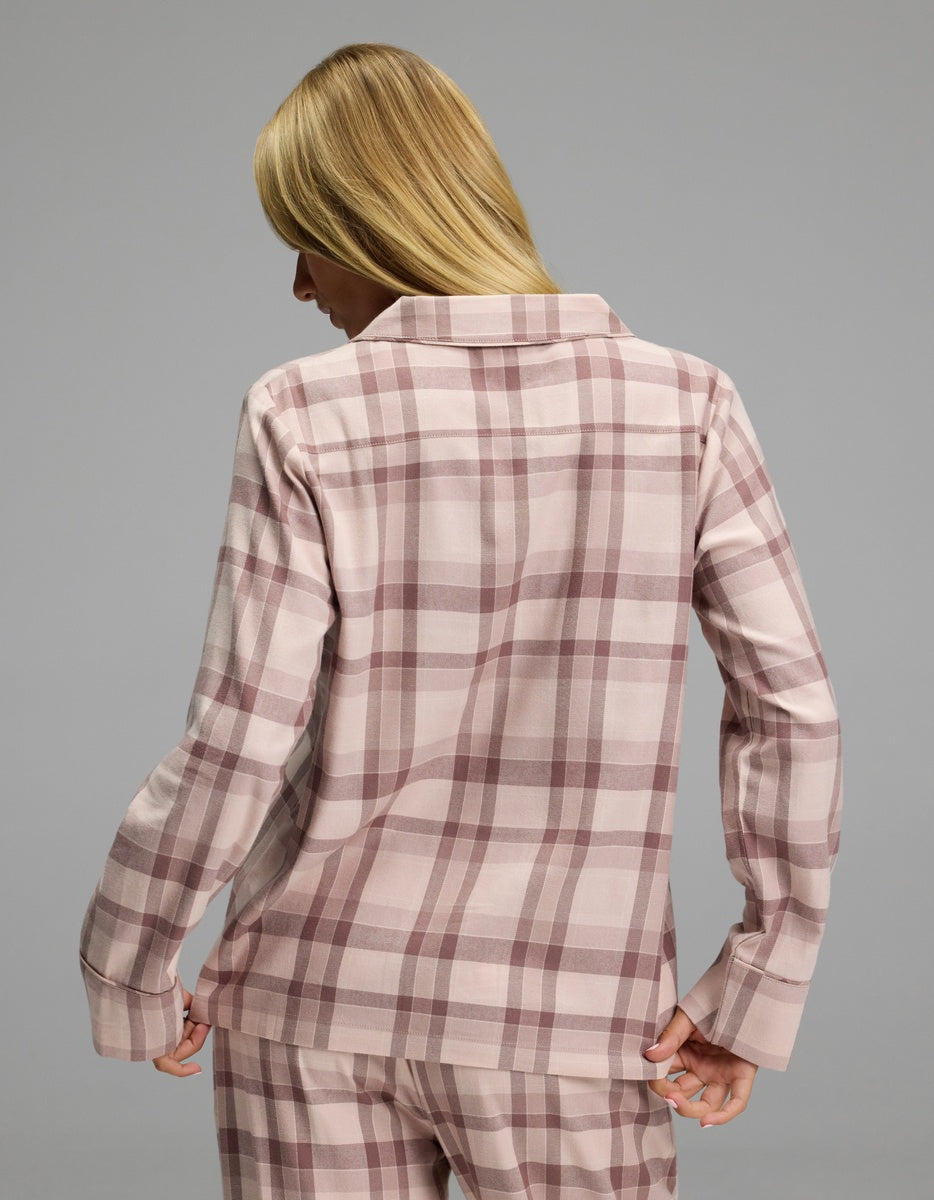 Back view of a person wearing a pink and dark mauve plaid Cozy Earth Women’s Farmhouse Long Sleeve Pajama Top.
