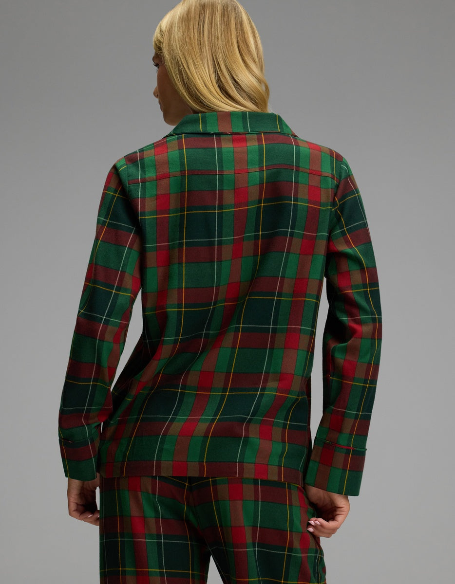 Back view of a person wearing a red and green plaid Women’s Farmhouse Long Sleeve Pajama Top.