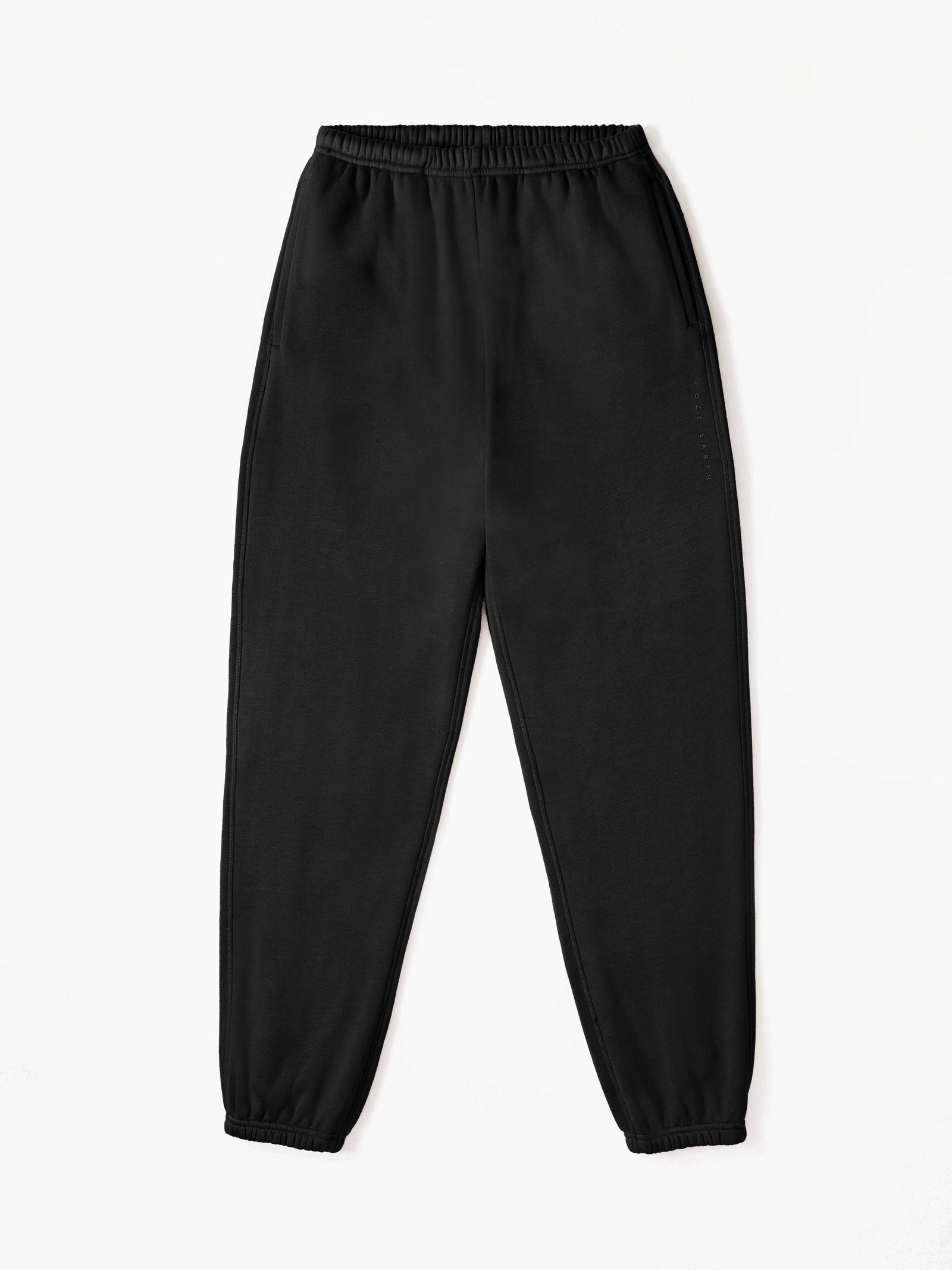 Black CityScape Joggers. The Joggers are laying flat over a white background. 