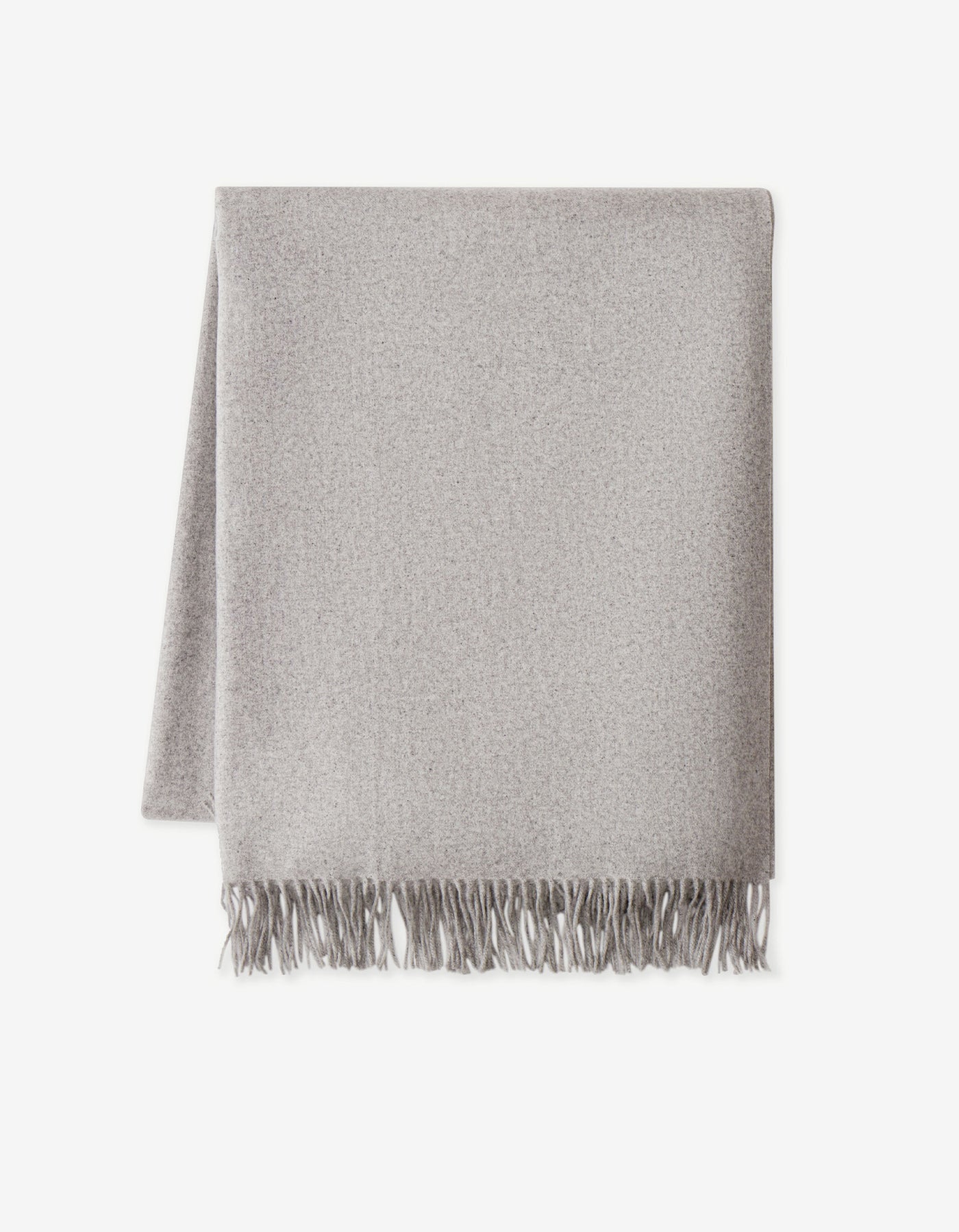 A folded light gray Cashmere Tassel Throw by Cozy Earth, featuring fringed ends and displayed on a white background.