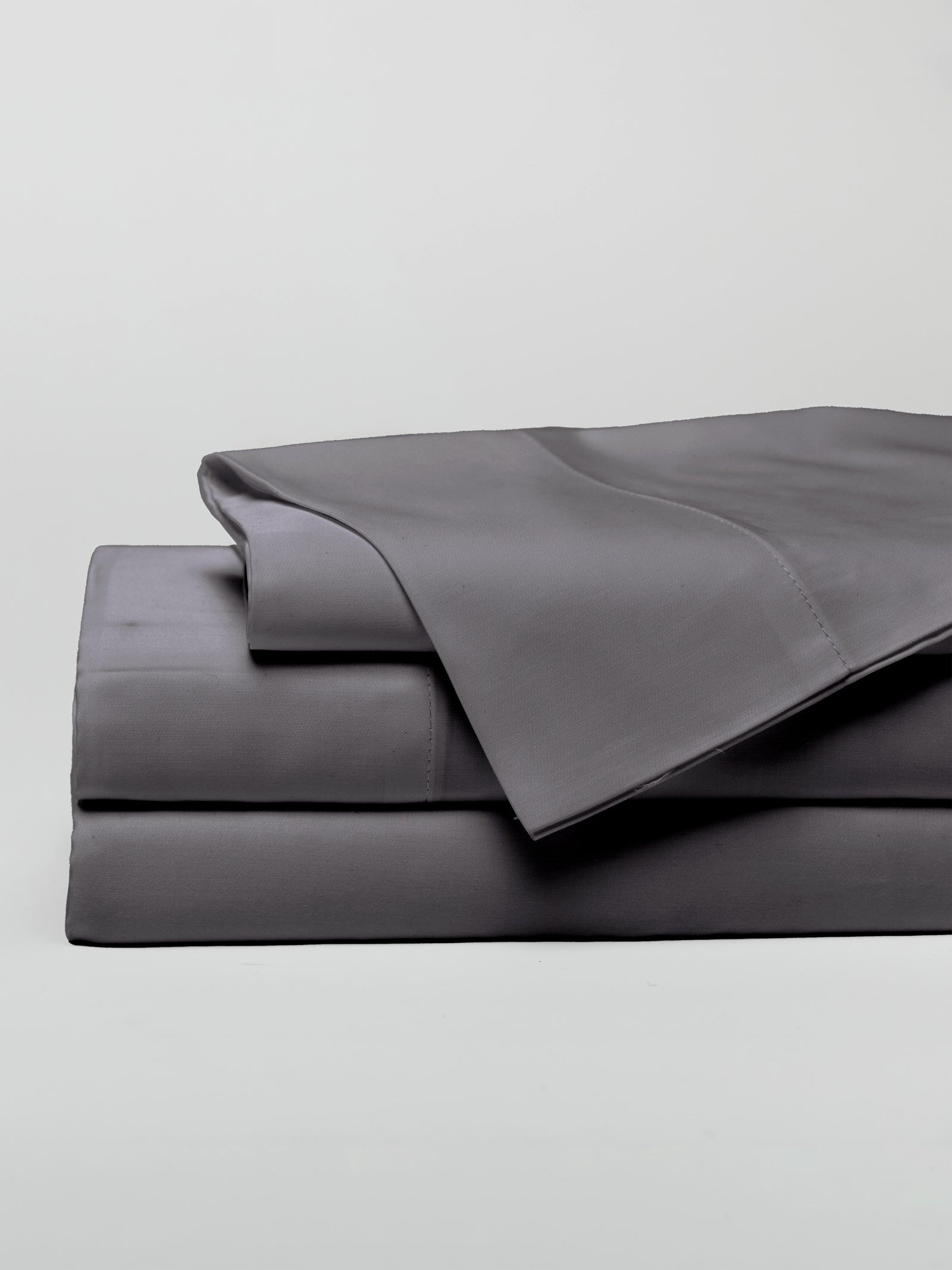 Charcoal sheet set folded with a white background 