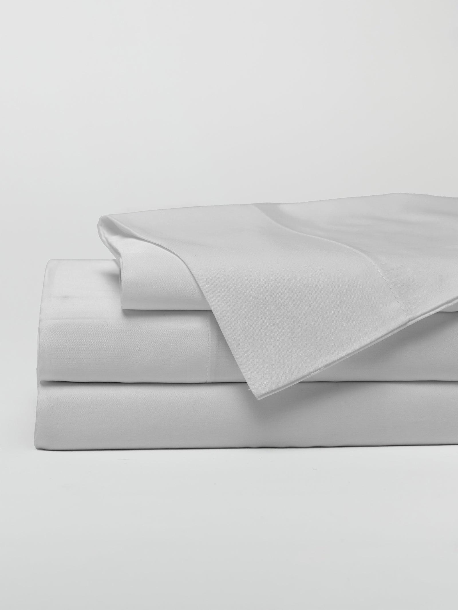 Light Grey sheet set folded with a white background 