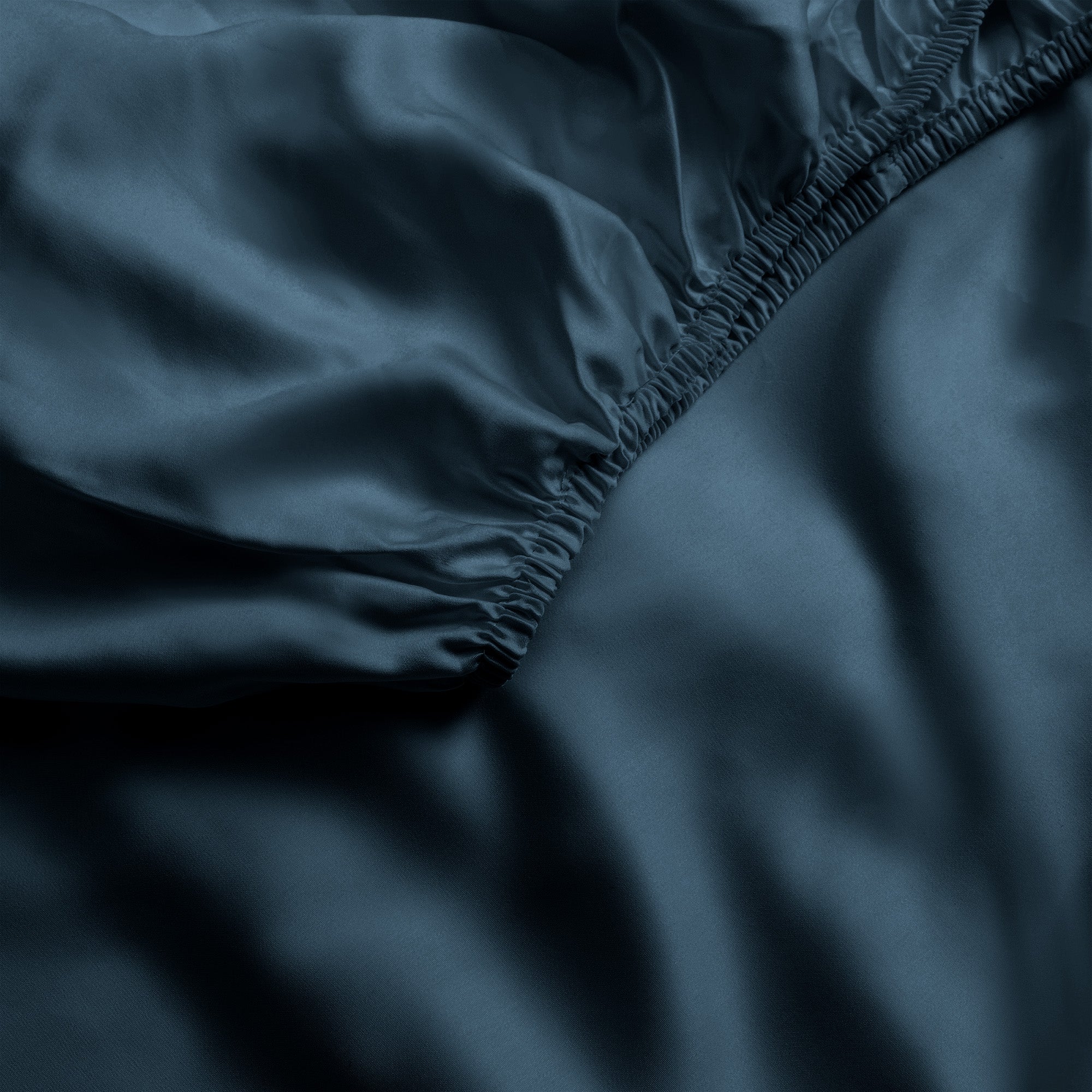 Close up of pacific blue fitted crib sheet |Color:Pacific Blue