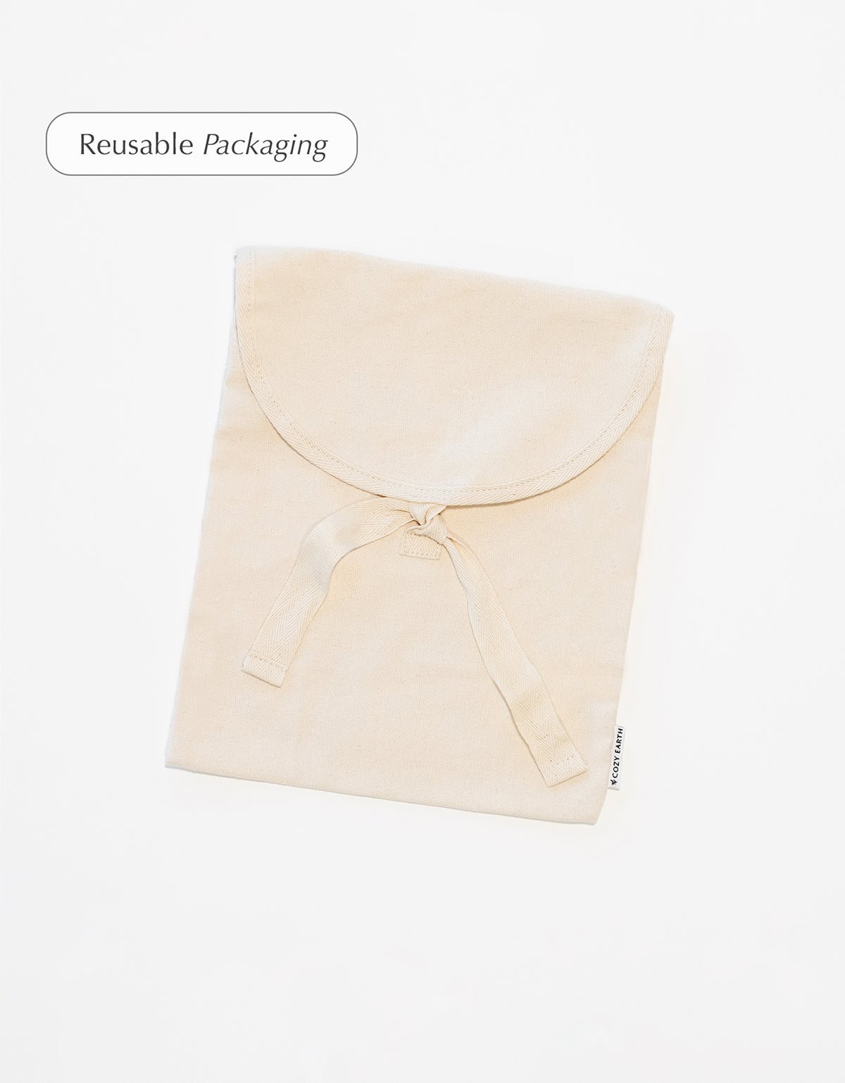 Beige reusable packaging on a white background with 'Reusable Packaging' text. Driftwood, charcoal, white, creme, walnut, light grey, oat, pacific blue, peony, laurel, shore, dove grey