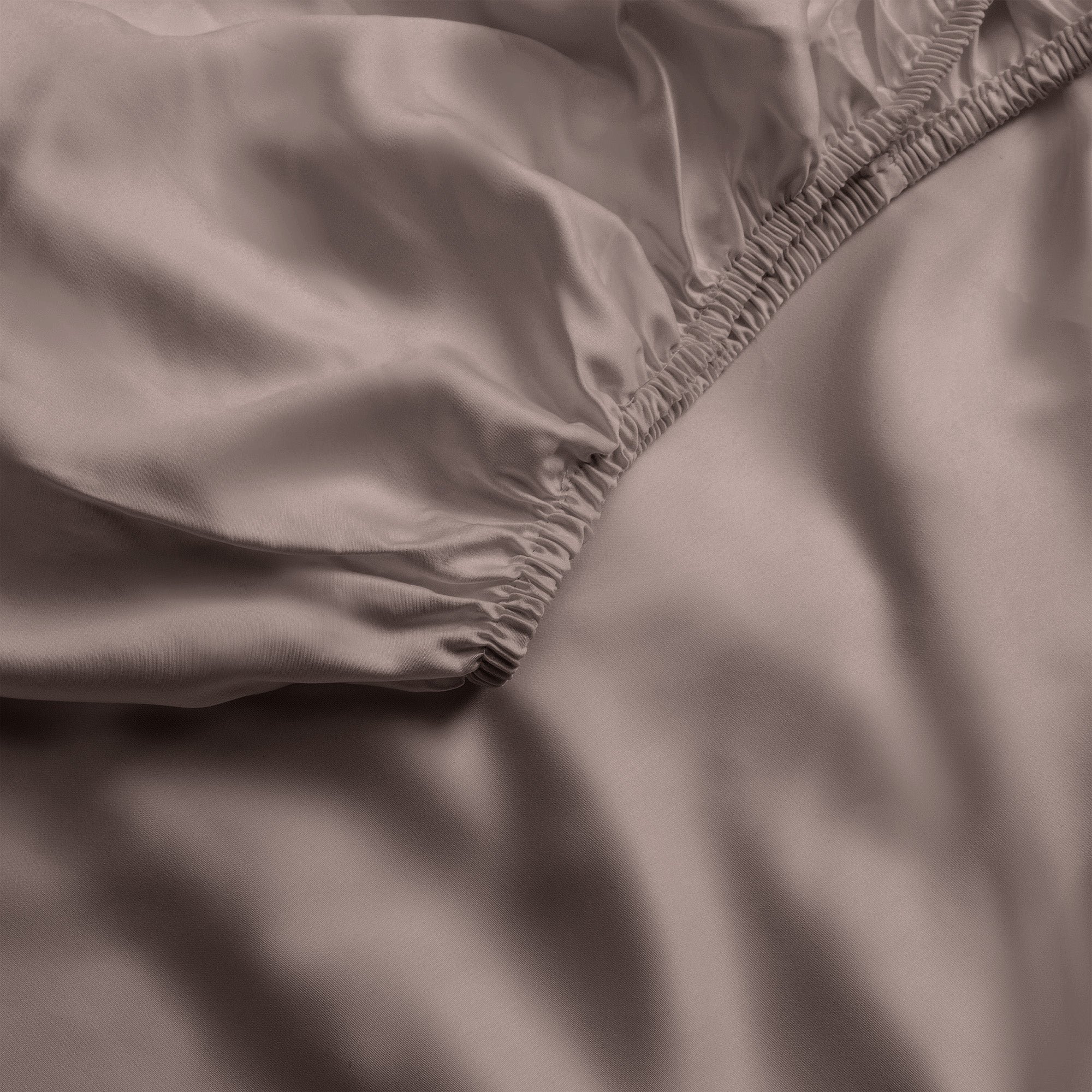 Close up of stone fitted crib sheet 