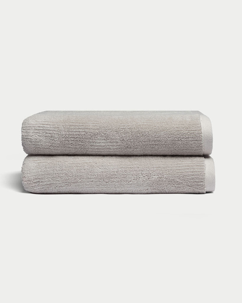 Ribbed Terry Bath Towels in the color Light Grey. Photo of Light Grey Waffle Bath Towels taken with white background. 