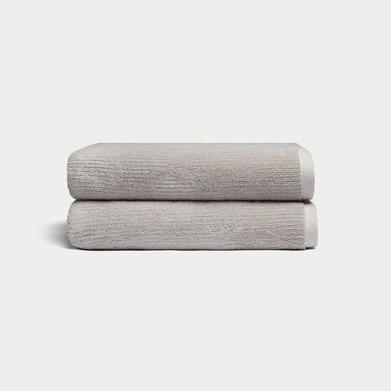 Ribbed Terry Bath Towels in the color Light Grey. Photo of Light Grey Waffle Bath Towels taken with white background.