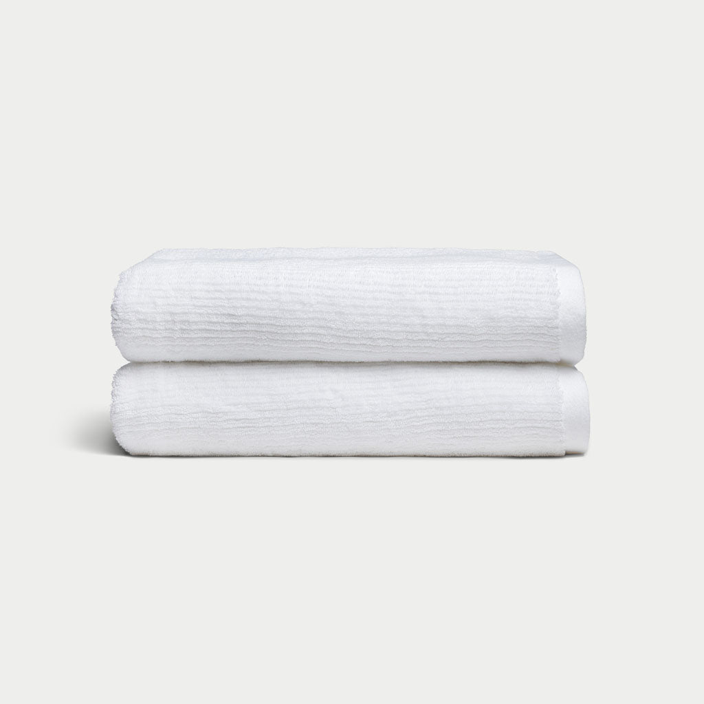 Ribbed Terry Bath Towels in the color White. Photo of White Waffle Bath Towels taken with white background. |Color:White