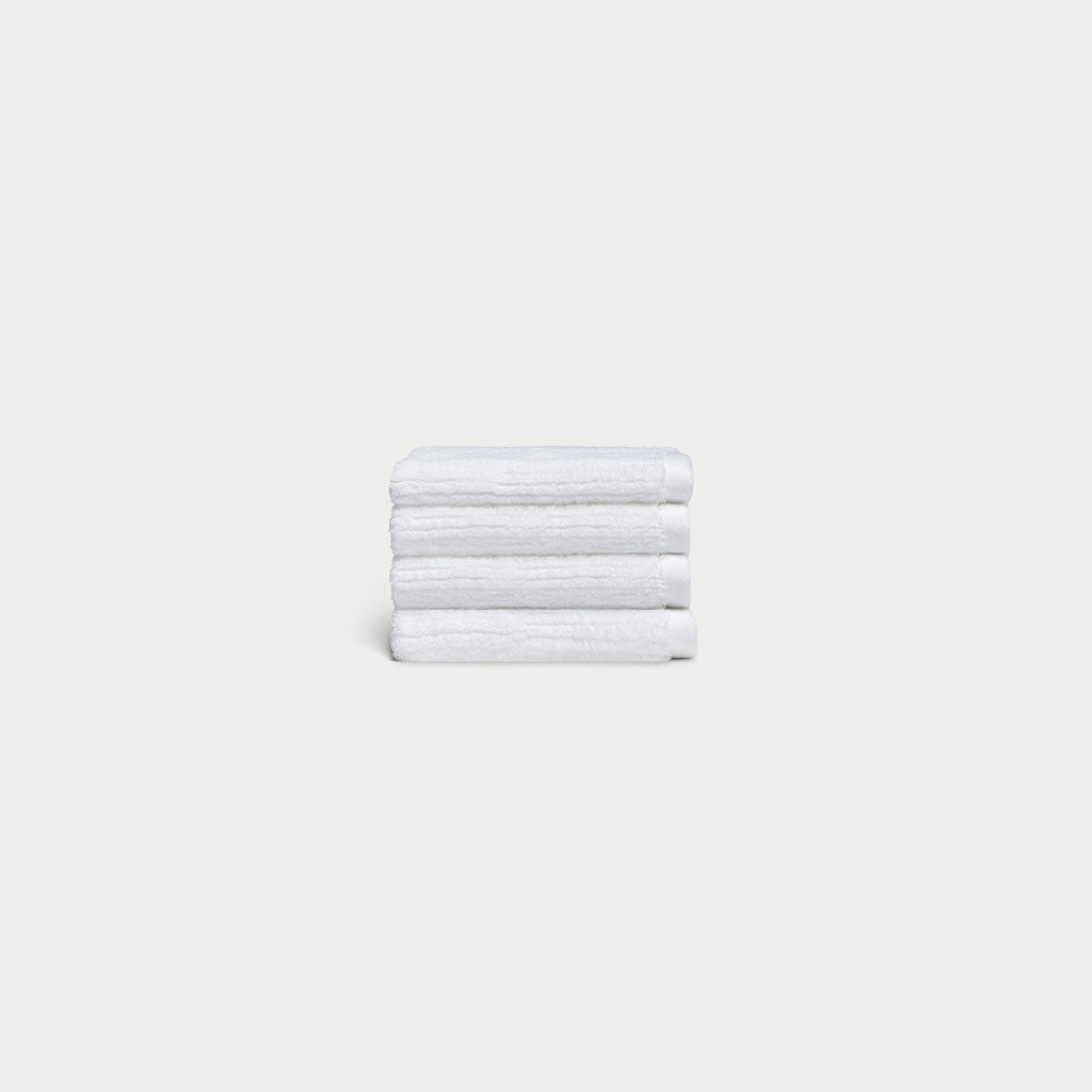 Ribbed Terry Wash Cloths in the color White. Photo of product taken with white background. |Color:White