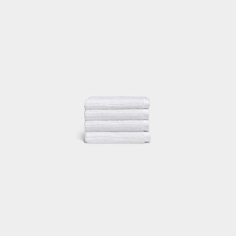 Ribbed Terry Wash Cloths in the color White. Photo of product taken with white background.
