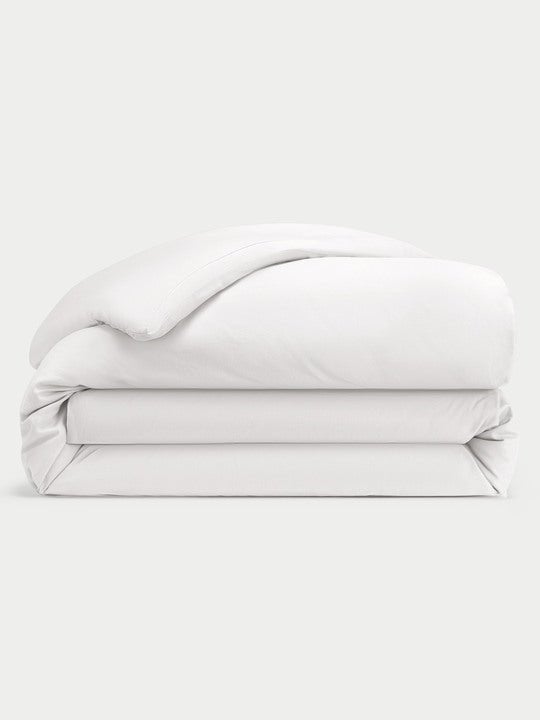 White Linen Duvet Cover neatly folded over white background. |Color: White