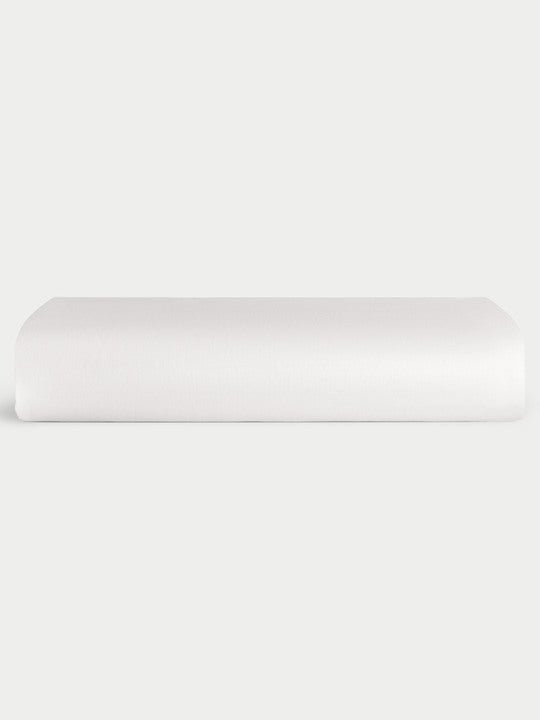 White Bamboo Linen Fitted Sheet Folded over a white background. 
