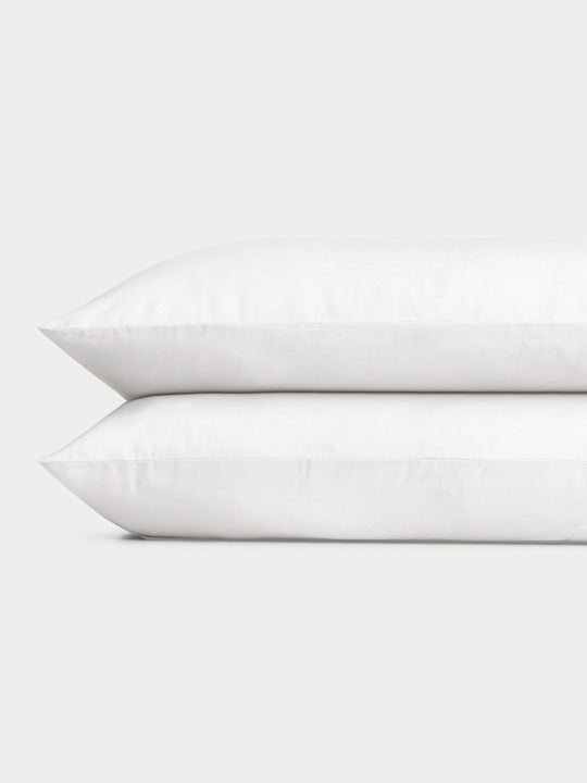 White Linen Bamboo Pillow Shams photographed over a white background. 