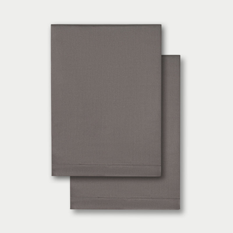 Flat lay of two standard/king pillowcases in charcoal