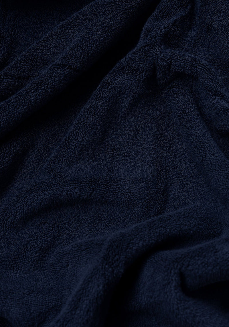 Premium Plush Bath Towel in the color Dusk. Photo of Dusk Premium Plush Bath Towel taken as a close up only showing the Premium Plush Bath Towel's texture