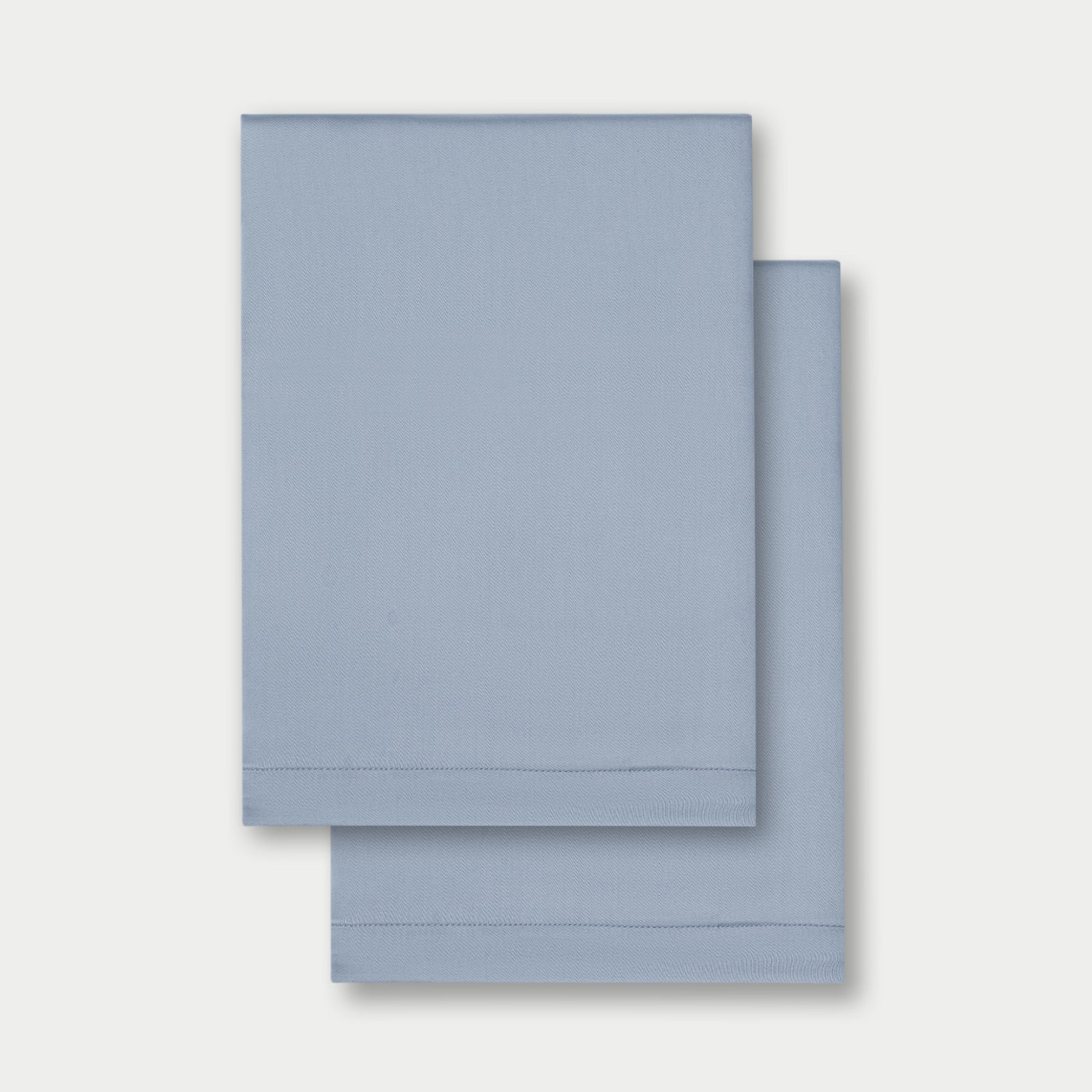 Flat lay of two pillowcases in harbor mist standard/king/body