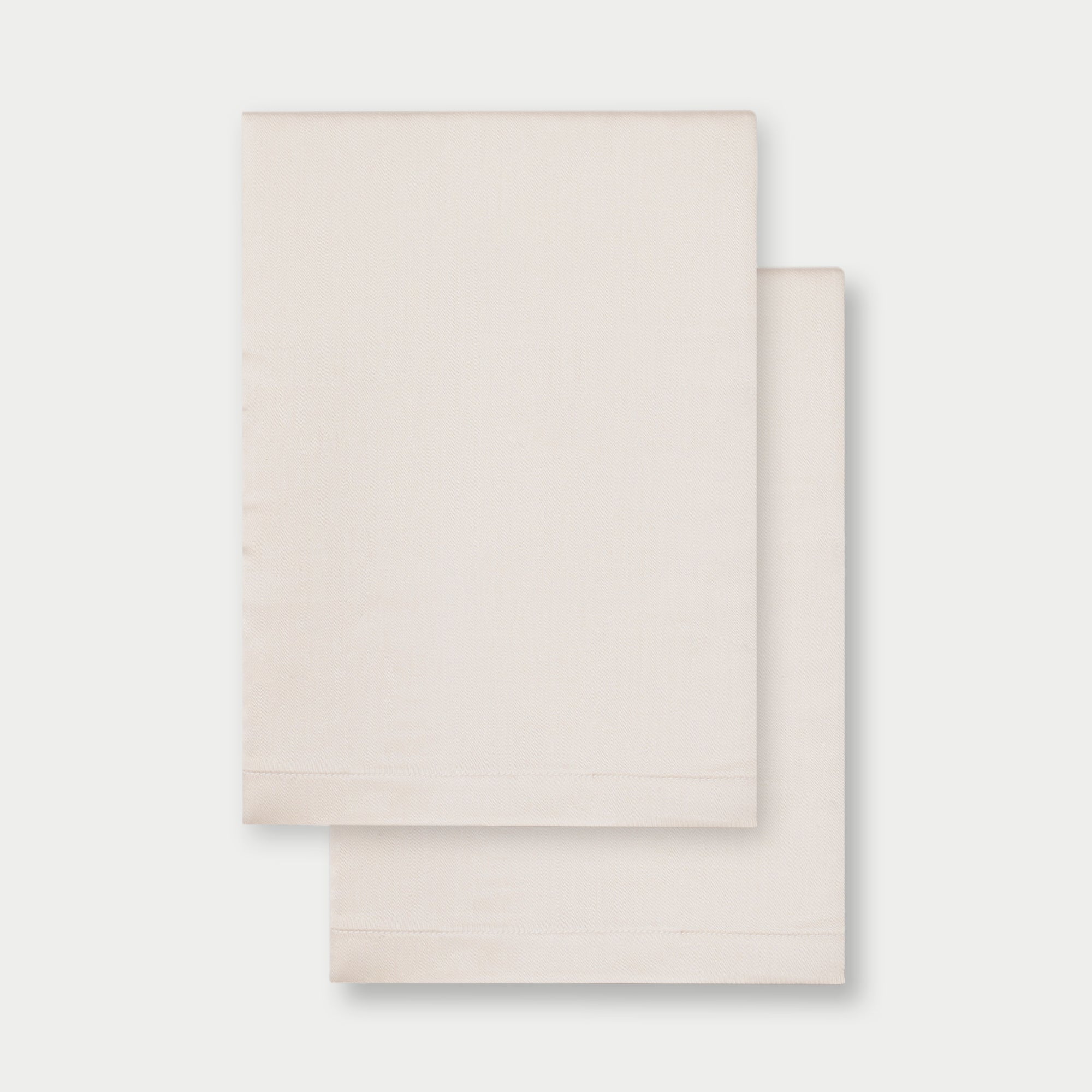 Flat lay of two pillowcases in oat standard/king/body 